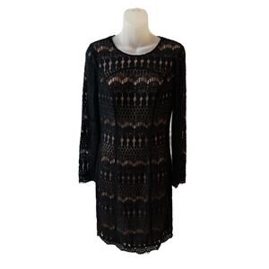 Black cocktail dress with lace over lay. Black house white market size 6